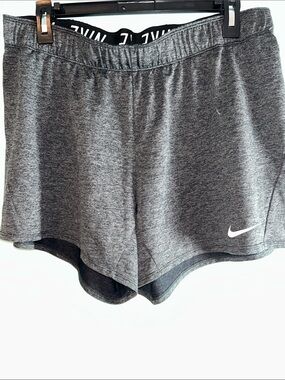 Nike Women's Dark Gray Athletic Shorts with White Swoosh